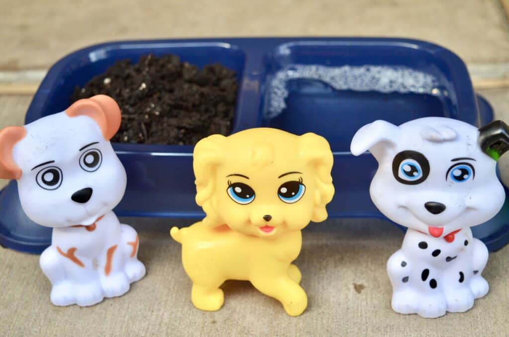 toy dog sensory bin