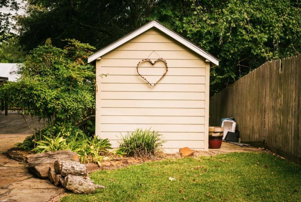 garden shed with heart decor stock