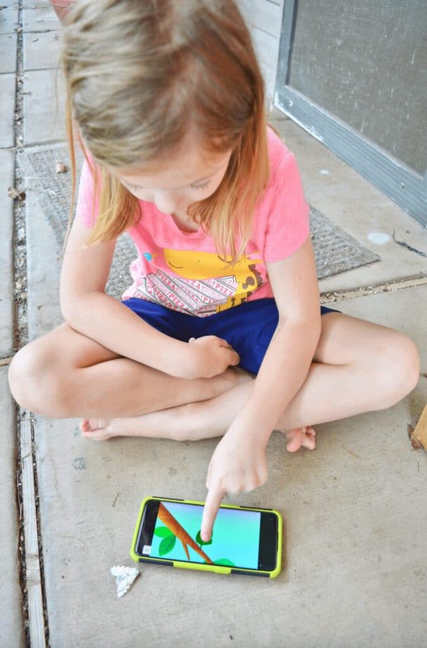 girl playing with Noggin learning app