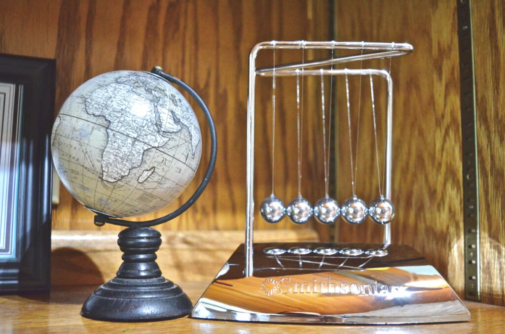 Newton's cradle and globe