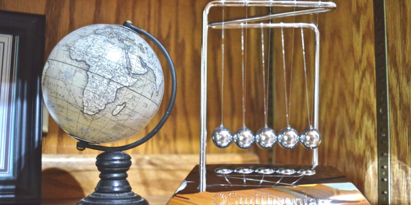 Newton's cradle and globe