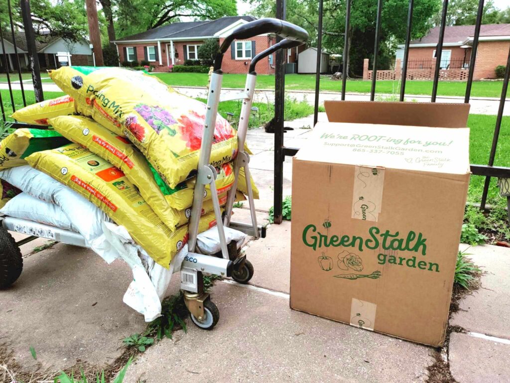 cart of potting soil mix for the  Greenstalk Vertical Garden Planter!